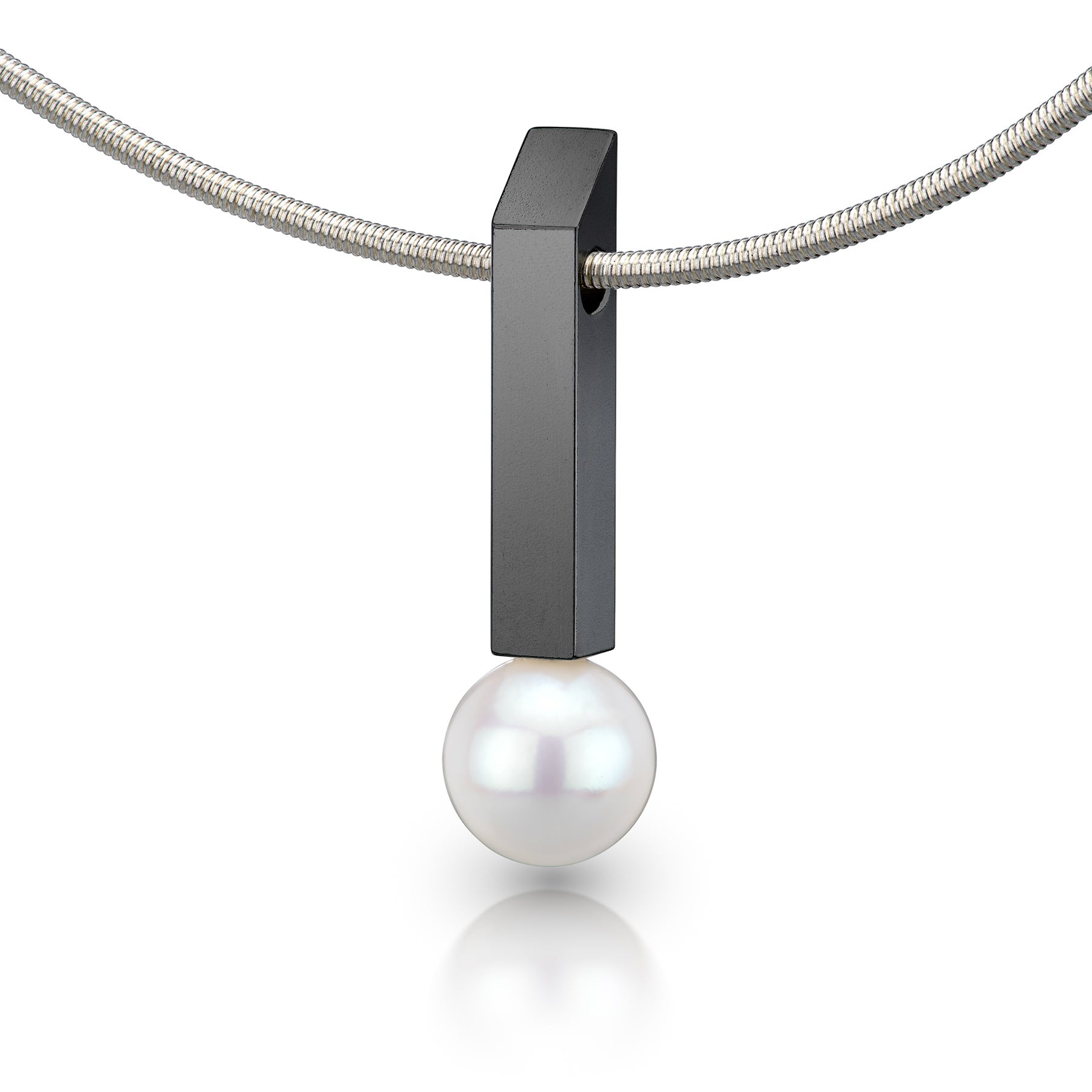 Oxidized sterling silver bar pendant with white pearl drop on a pure silver neck wire.